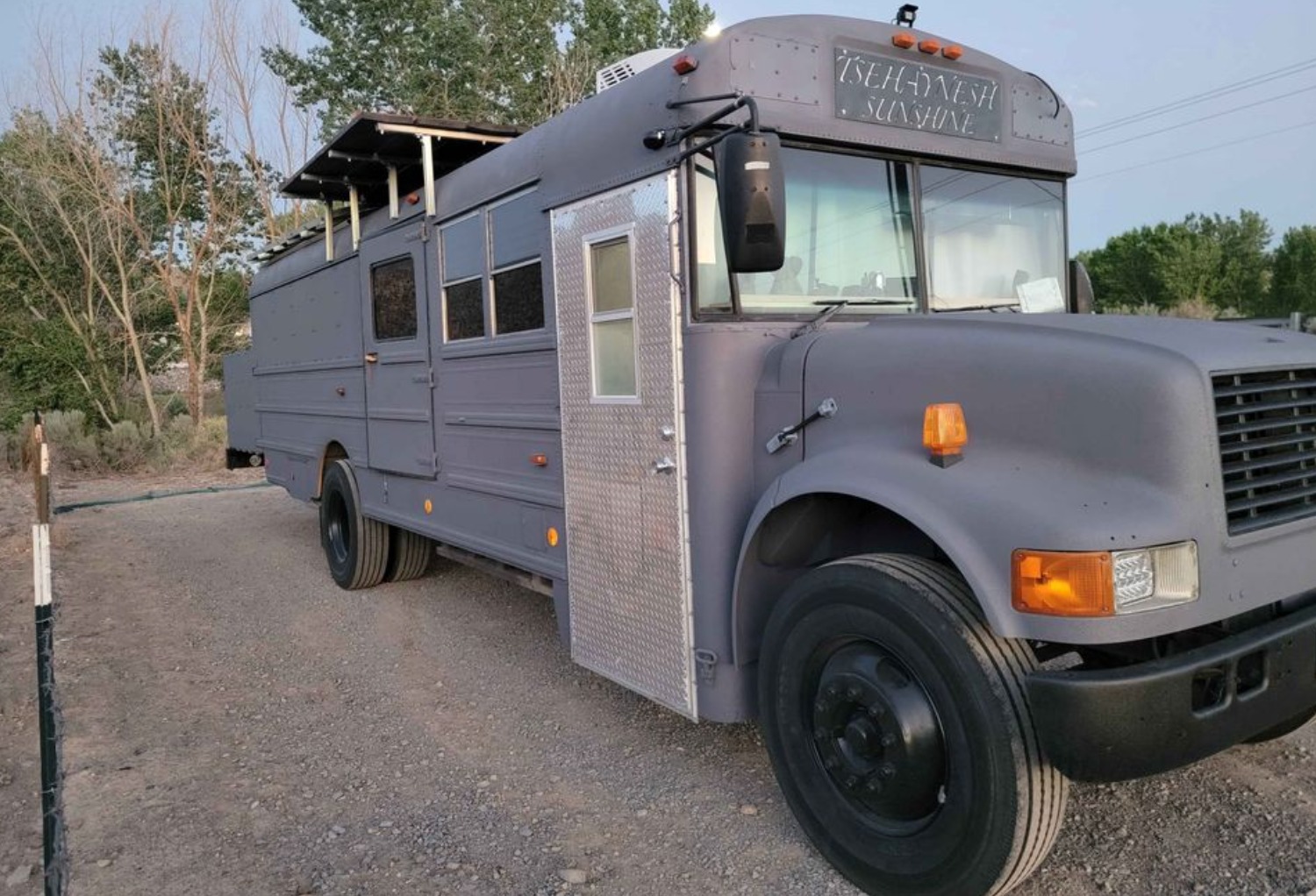 The Beast — front three-quarter view showing 'Tsehay Nesh Sunshine' nameplate