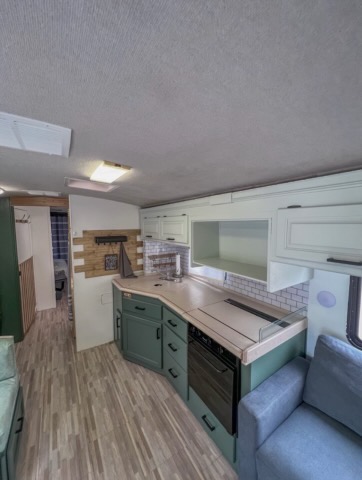 Pinkford RV interior — custom kitchen